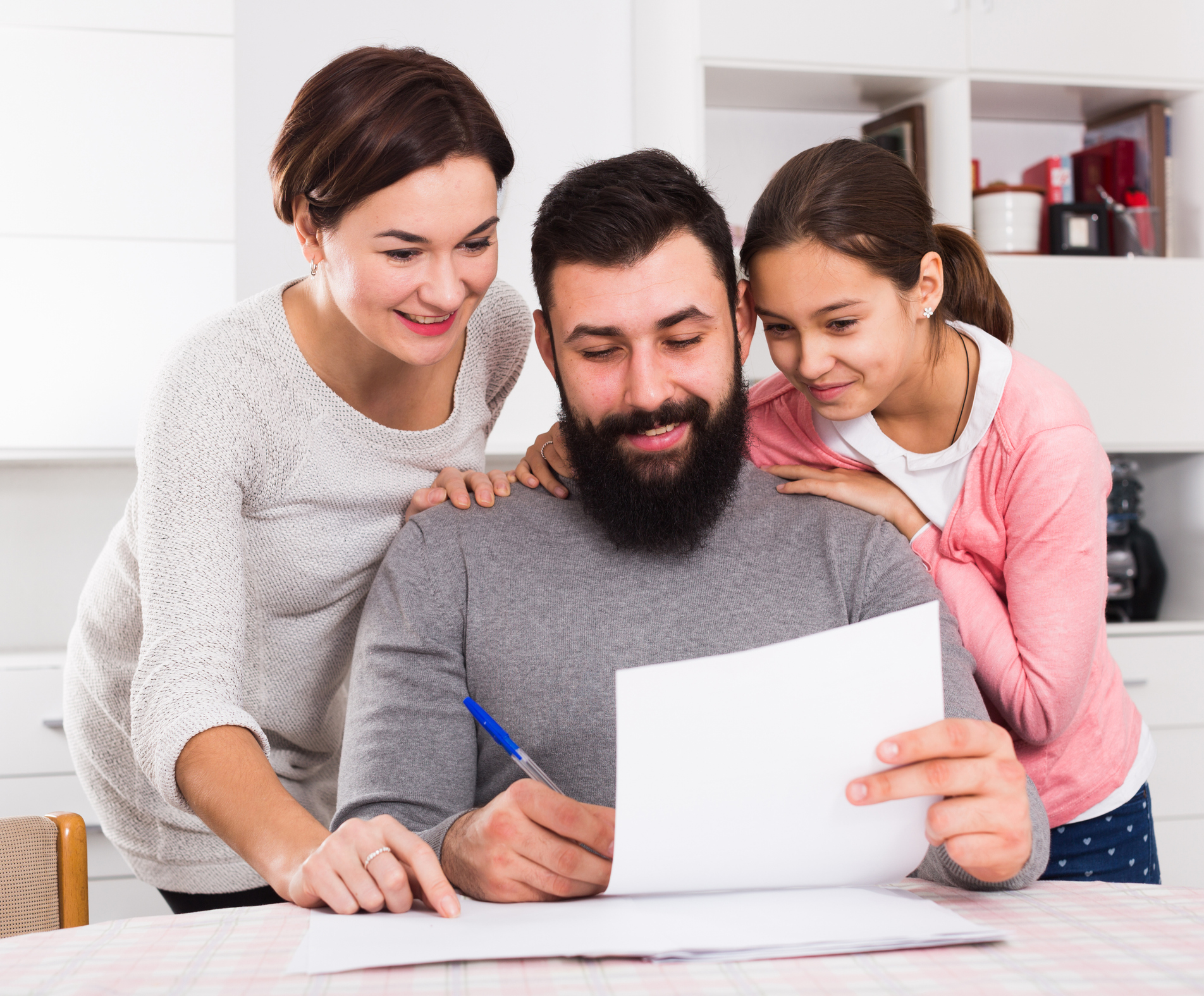 Family writing a letter.