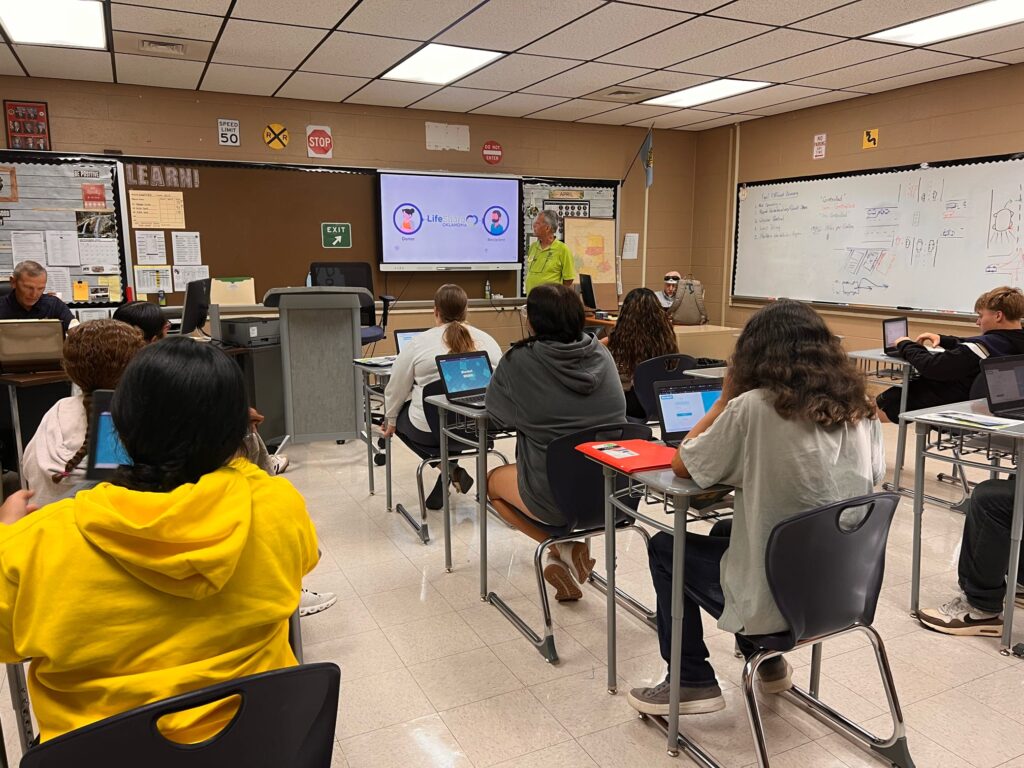 A volunteer sharing the importance of being an organ donor.