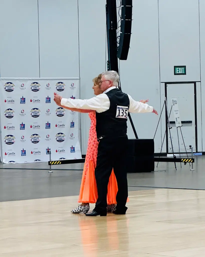 Melvin Cook, lung transplant recipient, at the Transplant Games of America performing a ballroom dance with his partner